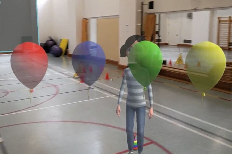 Pop'Balloons, un gioco progettato per aiutare i bambini autistici a sviluppare le loro capacità motorie. Credito: Università di Montreal